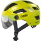 ABUS kerékpáros városi sisak Hyban 2.0 ACE, ABS, beépített átlátszó szemüveggel, signal yellow, M (52-58 cm)